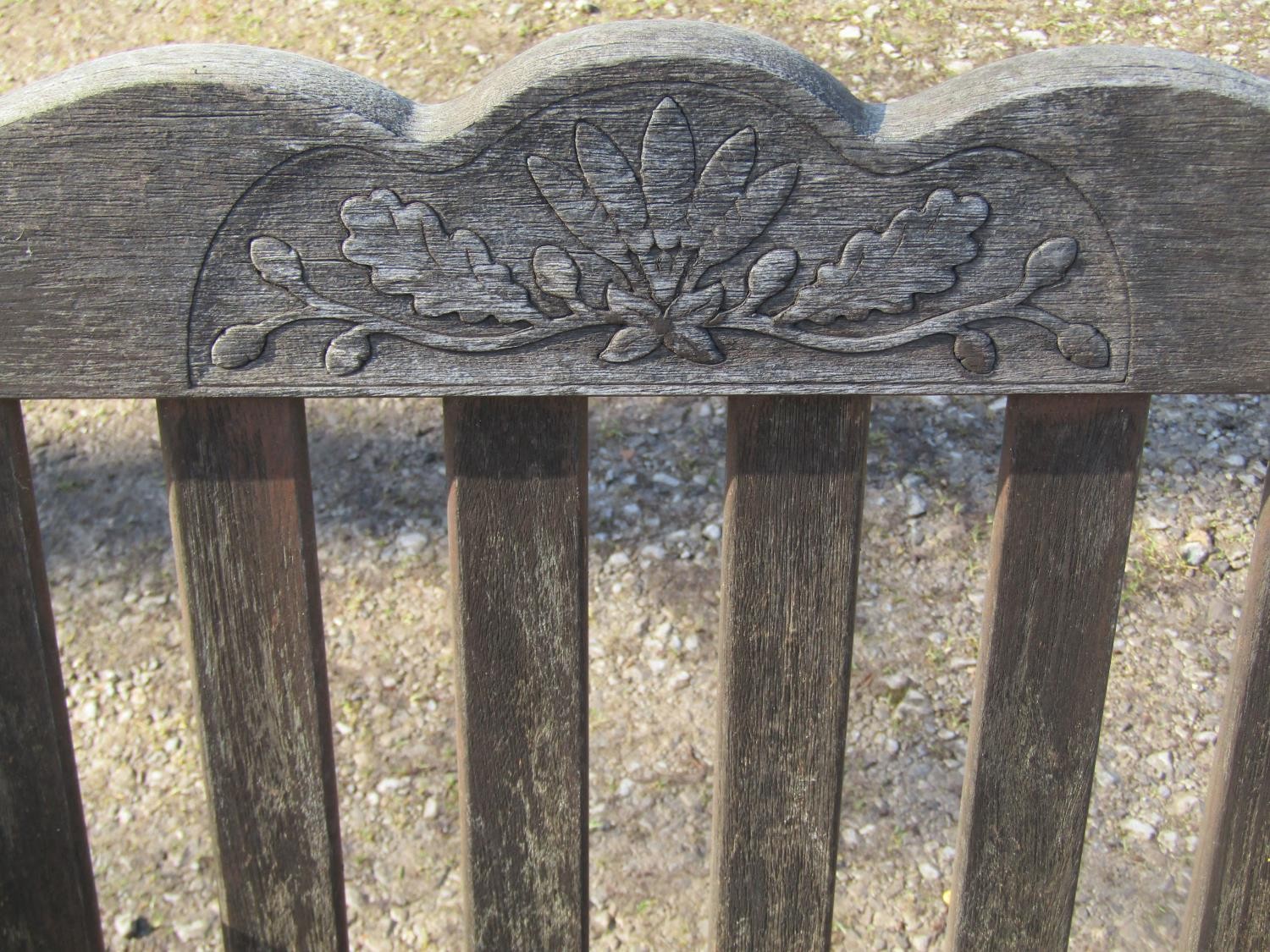A Bridgman & Co Ltd stained and weathered teak three seat garden bench 161 cm wide and a pair of - Image 3 of 11