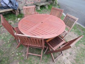 A Mayfair contemporary folding hardwood circular garden table with slatted top, 120cm diameter