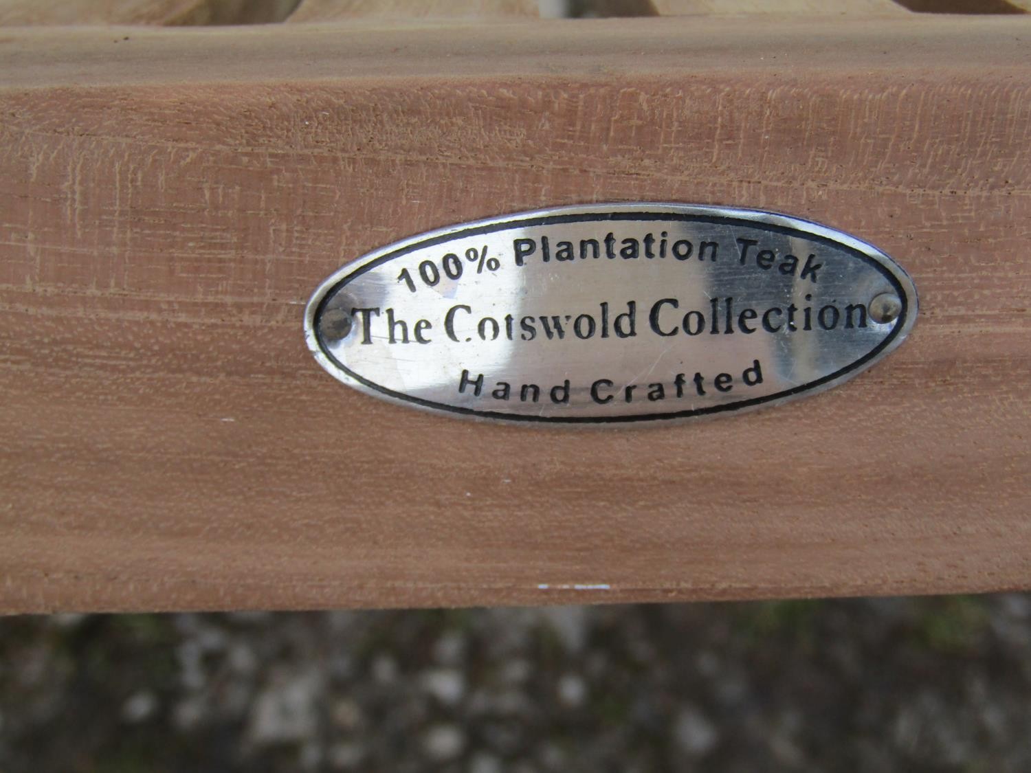 A contemporary weathered Cotswold collection garden table with oval slatted top raised on x framed - Image 9 of 9