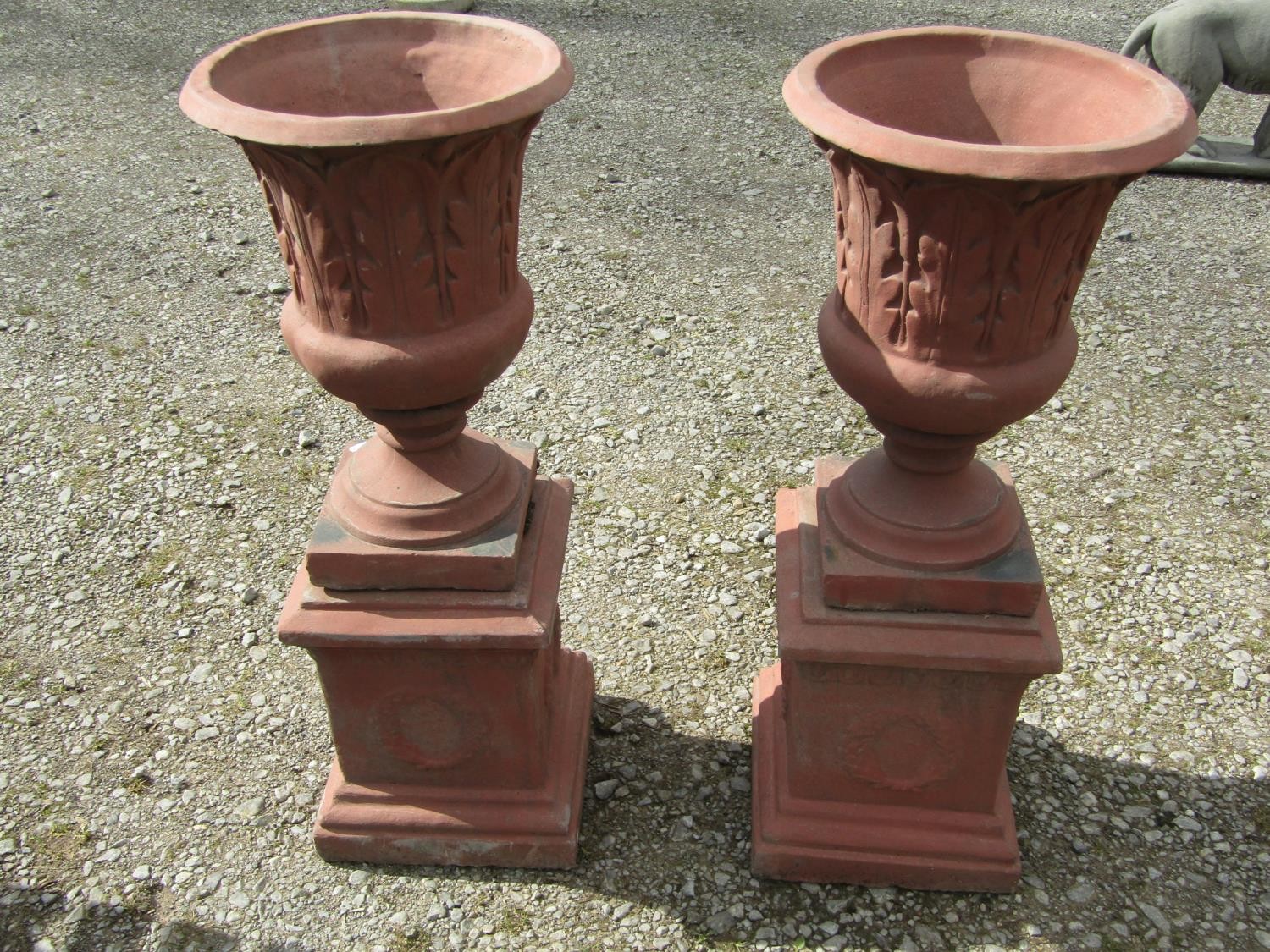 A pair of faux terracotta cast composition stone trumpet shaped garden urns with repeating leaf - Image 3 of 6