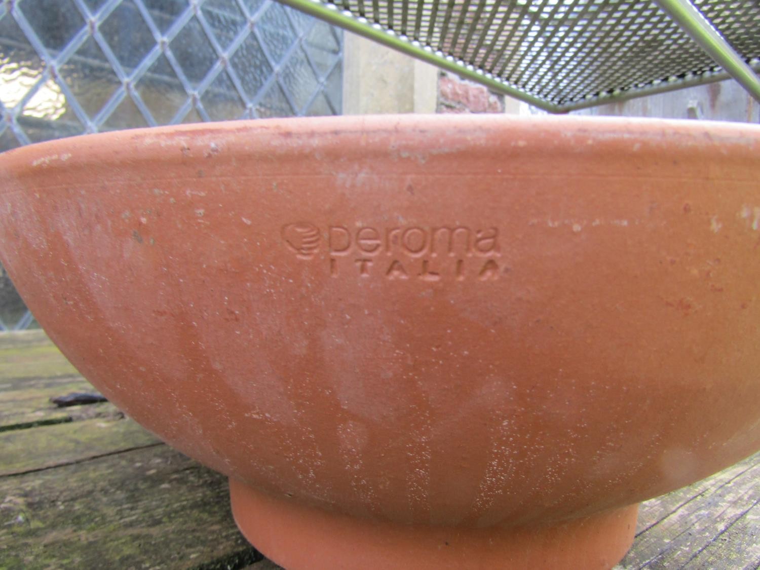 Twelve shallow squat circular terracotta planters (varying size), the larger examples 14 cm x 36 - Image 4 of 4