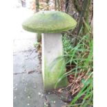 Four similar weathered cast composition stone staddle stones with domed caps raised on square