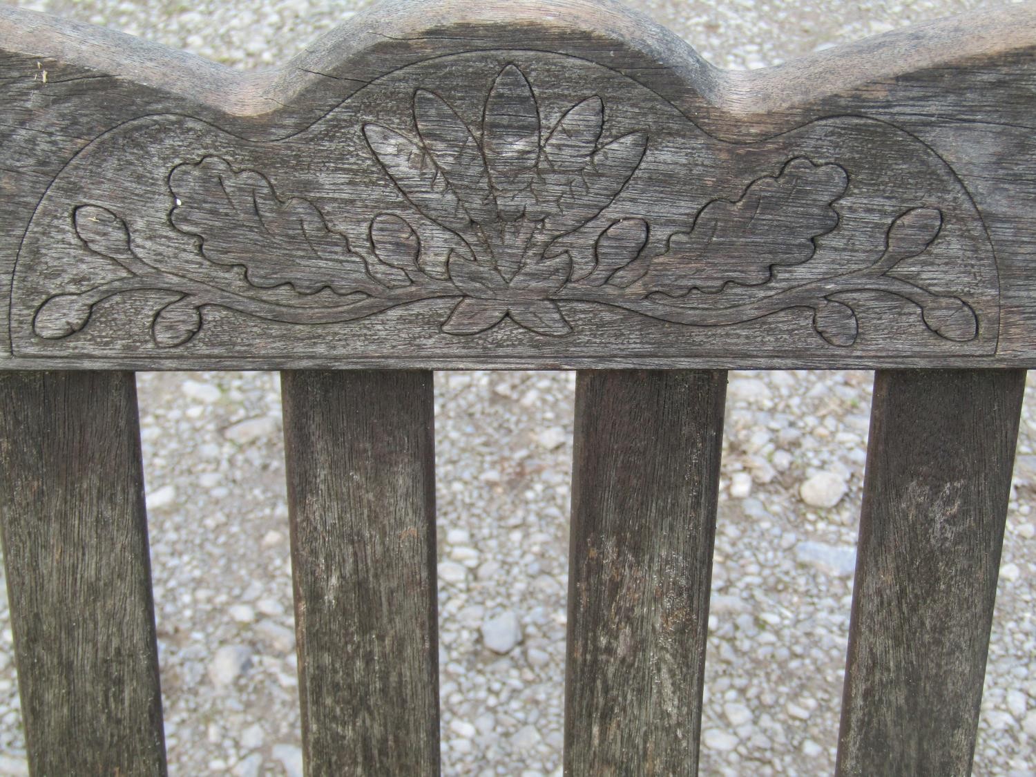 A Bridgman & Co Ltd stained and weathered teak three seat garden bench 161 cm wide and a pair of - Image 9 of 11