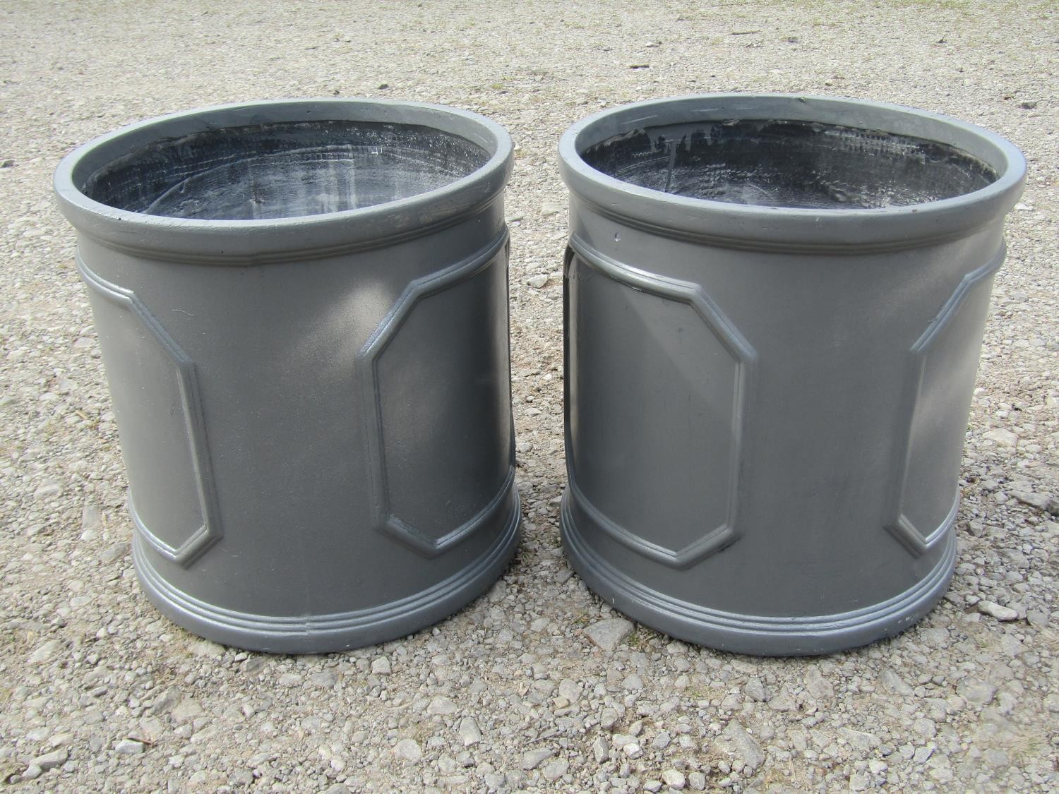 A pair of cylindrical fibre glass simulated lead planters with repeating panels, 38 cm high x 38 - Image 3 of 4