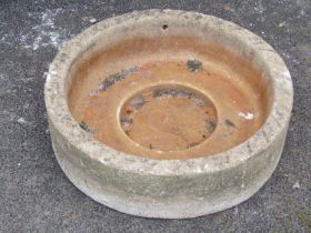 A weathered shallow cast composition stone trough/planter of circular form, 17 cm high x 61 cm