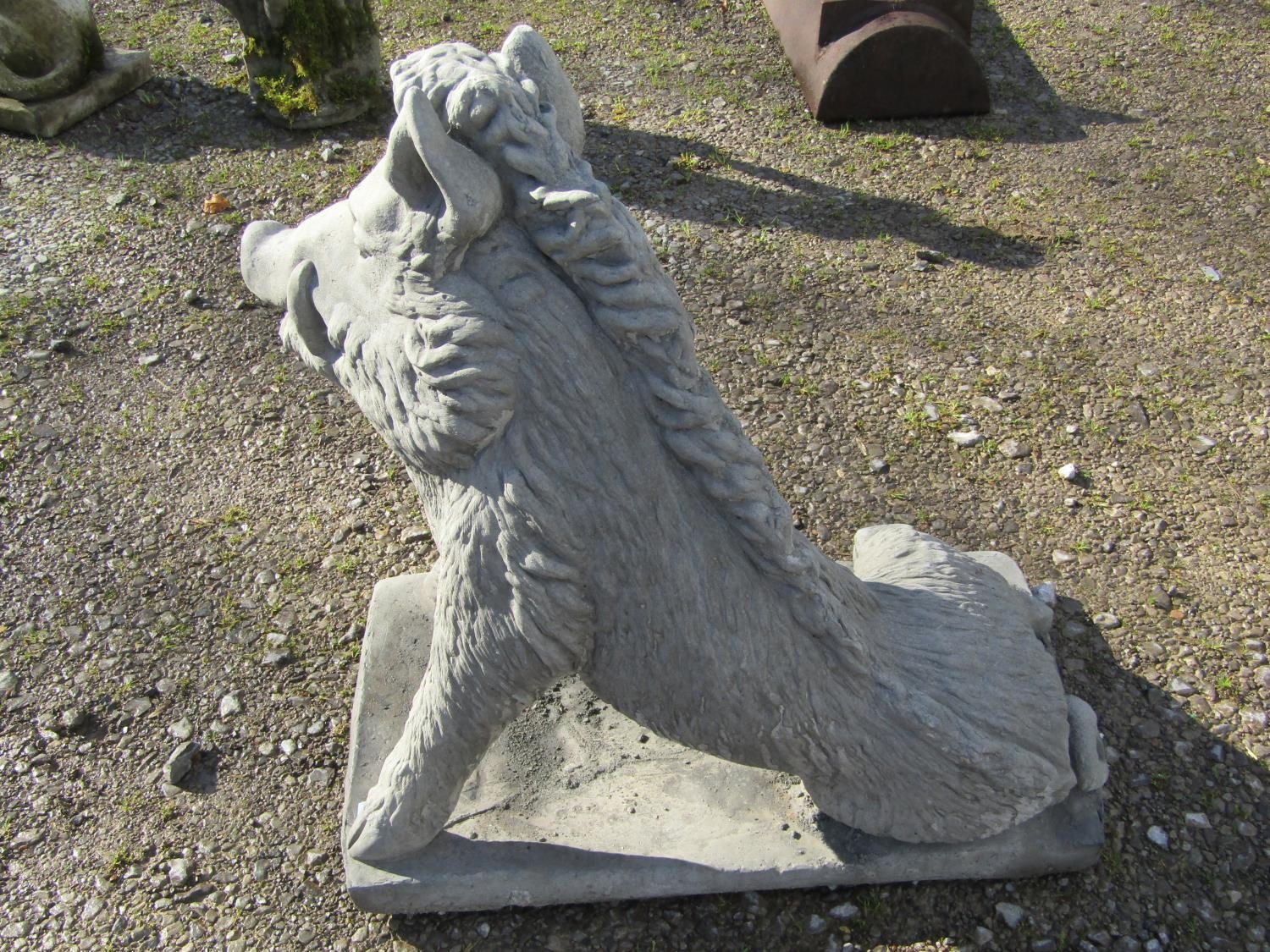 A life size cast composition stone garden ornament/study of a seated wild boar set on a - Image 4 of 5