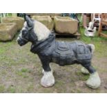 A painted and weathered cast composition stone garden ornament in the for of a Cart/heavy Horse,