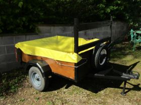 A two wheel car trailer with wooden body and steel framework, the main bed 154 x 123cm, 42cm high