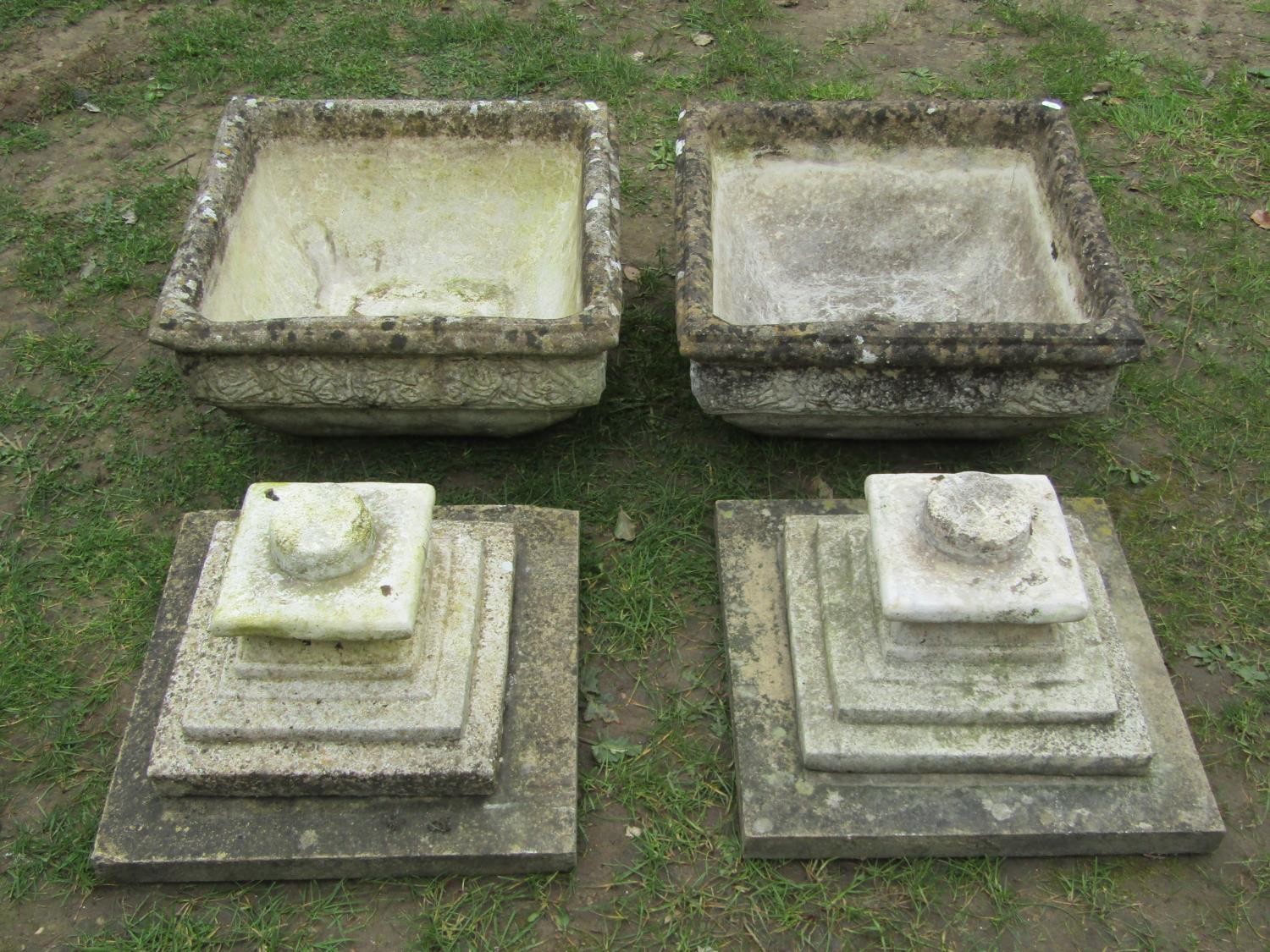 A pair of weathered cast composition stone garden urns of squat square cut and tapered form with - Image 4 of 4