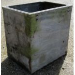 A vintage heavy gauge galvanised steel tank of rectangular form with pop riveted seams, 92 cm high x