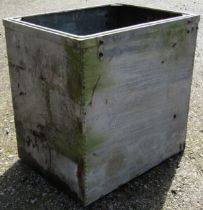 A vintage heavy gauge galvanised steel tank of rectangular form with pop riveted seams, 92 cm high x