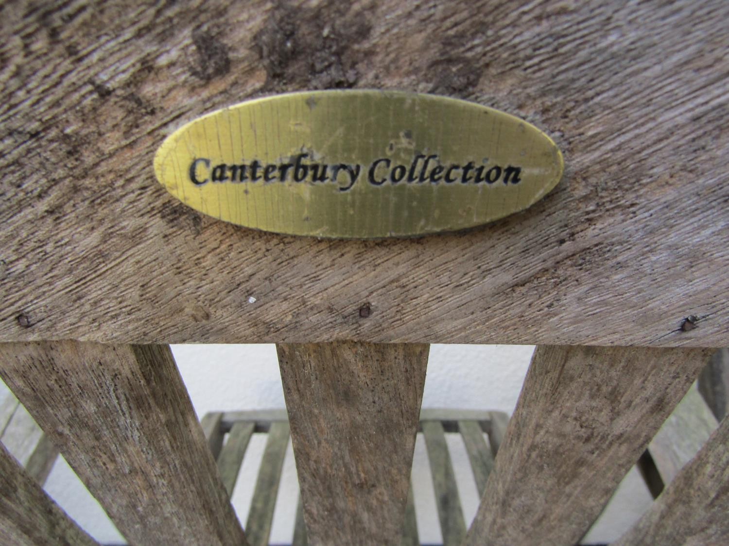 A Canterbury Collection weathered teak circular folding gateleg garden table and four matching - Image 7 of 8