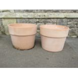 A pair of contemporary terracotta planters of circular tapered form with wide collars, 39m high x