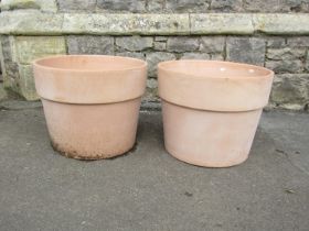 A pair of contemporary terracotta planters of circular tapered form with wide collars, 39m high x