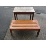 A vintage stained and weathered Lister burma teak garden table of rectangular form with slatted