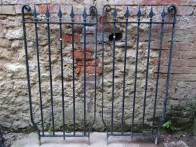 A pair of iron railings with simple open vertical bars with spear head finials 1501 cm high x 70
