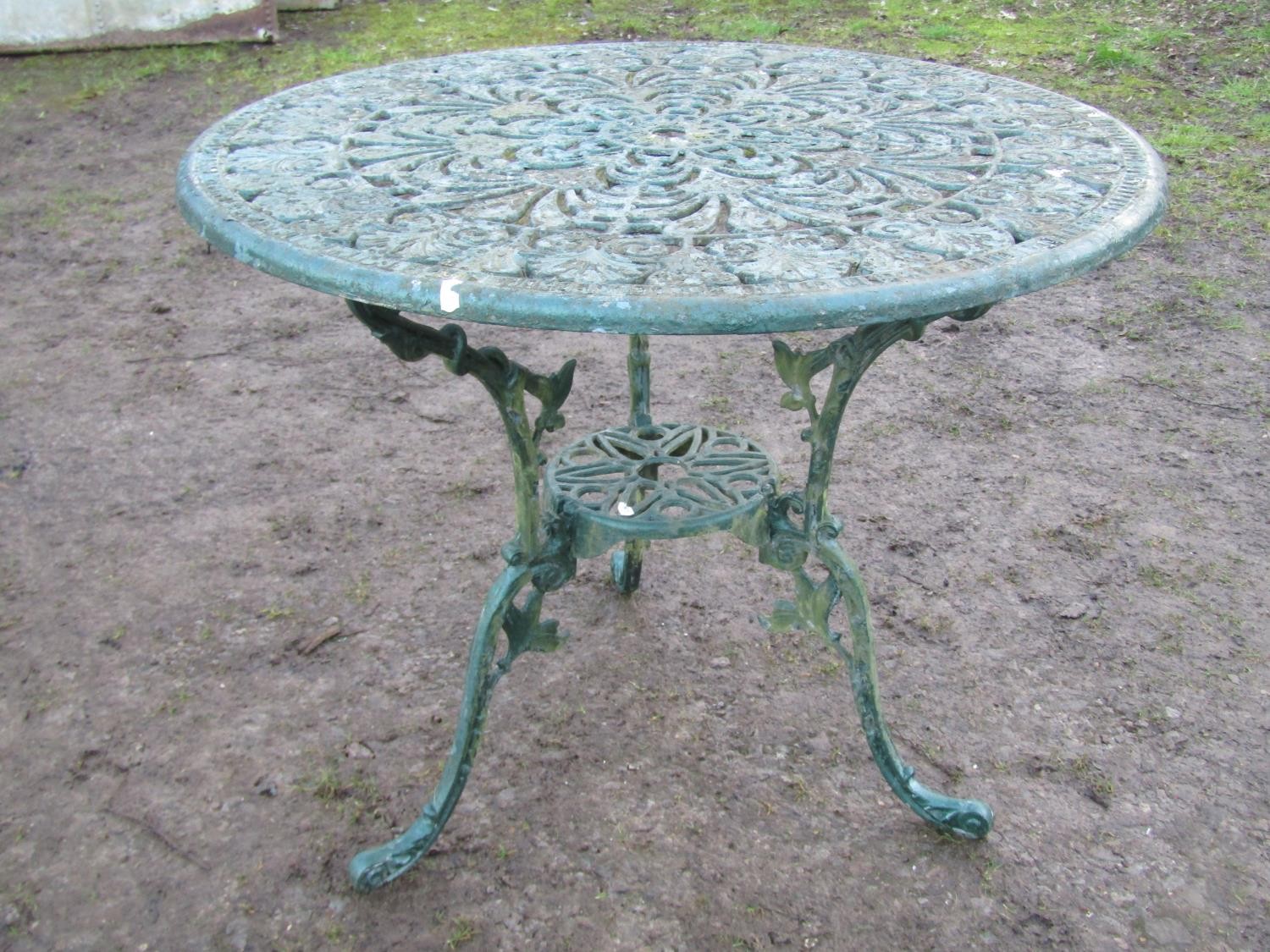A weathered green painted cast aluminium five piece garden terrace set with decorative pierced and - Image 3 of 4