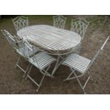 A light blue grey seven piece garden terrace set comprising table of oval form with strap work top