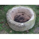 A good weathered cast composition stone trough squat circular form 57cm diameter x 24cm high