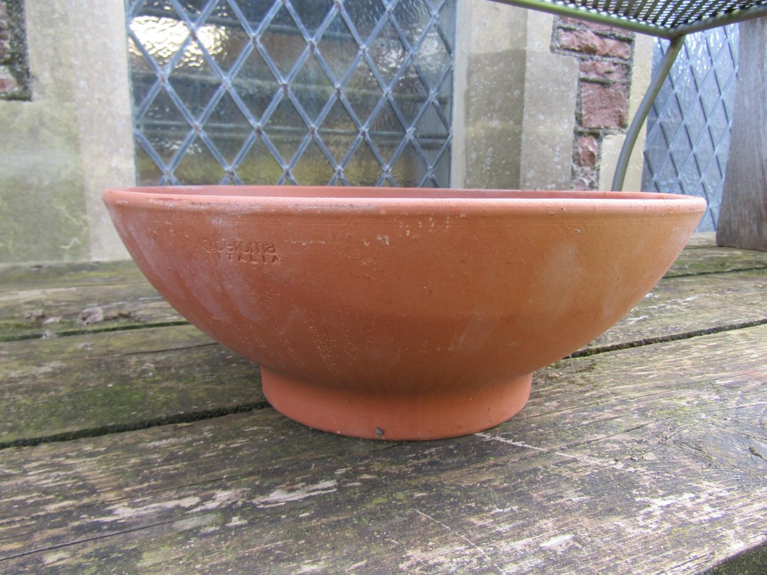 Twelve shallow squat circular terracotta planters (varying size), the larger examples 14 cm x 36 - Image 3 of 4