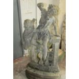 A 19th century weathered marble garden figure group, in the form of jostling infants on a
