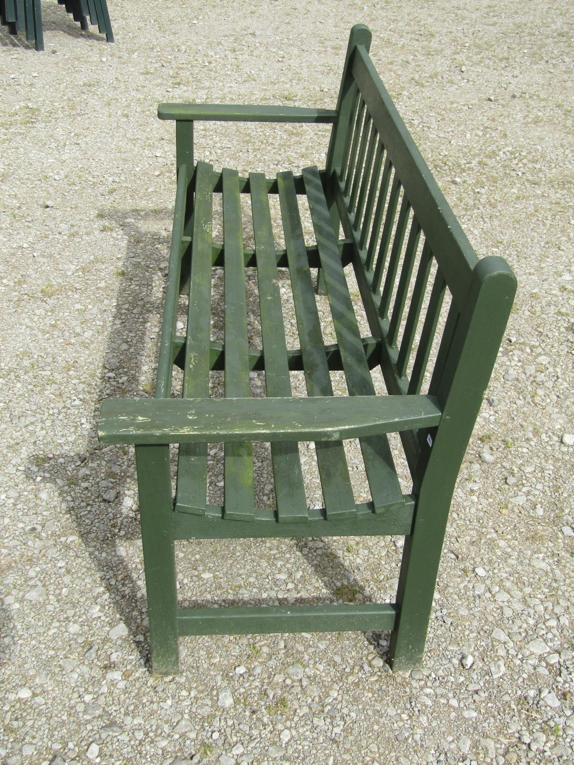 A vintage green painted teak three seat garden bench with slatted seat and back (probably a Lister - Image 2 of 5
