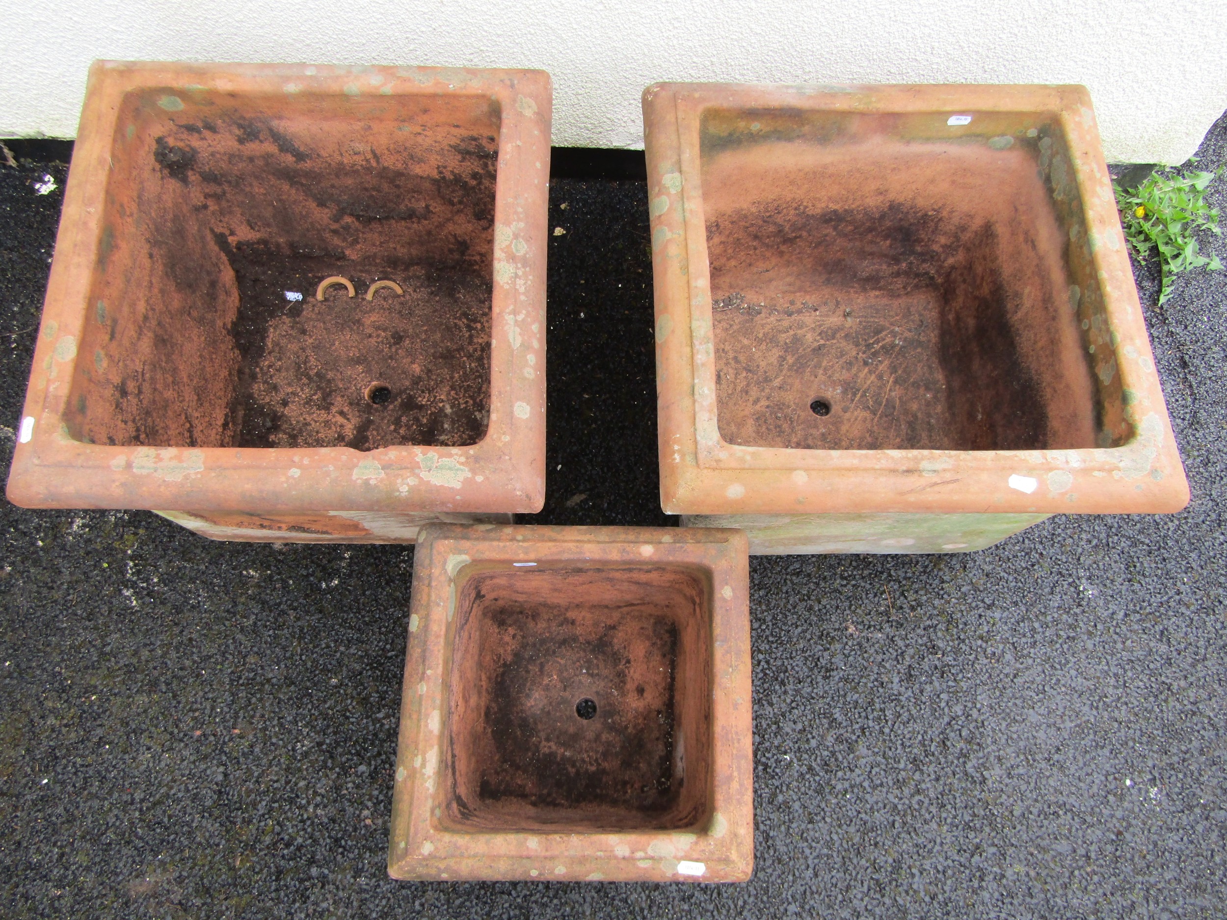 A pair of weathered terracotta planters of square cut form with moulded rims 42 cm high x 53 cm - Image 3 of 4