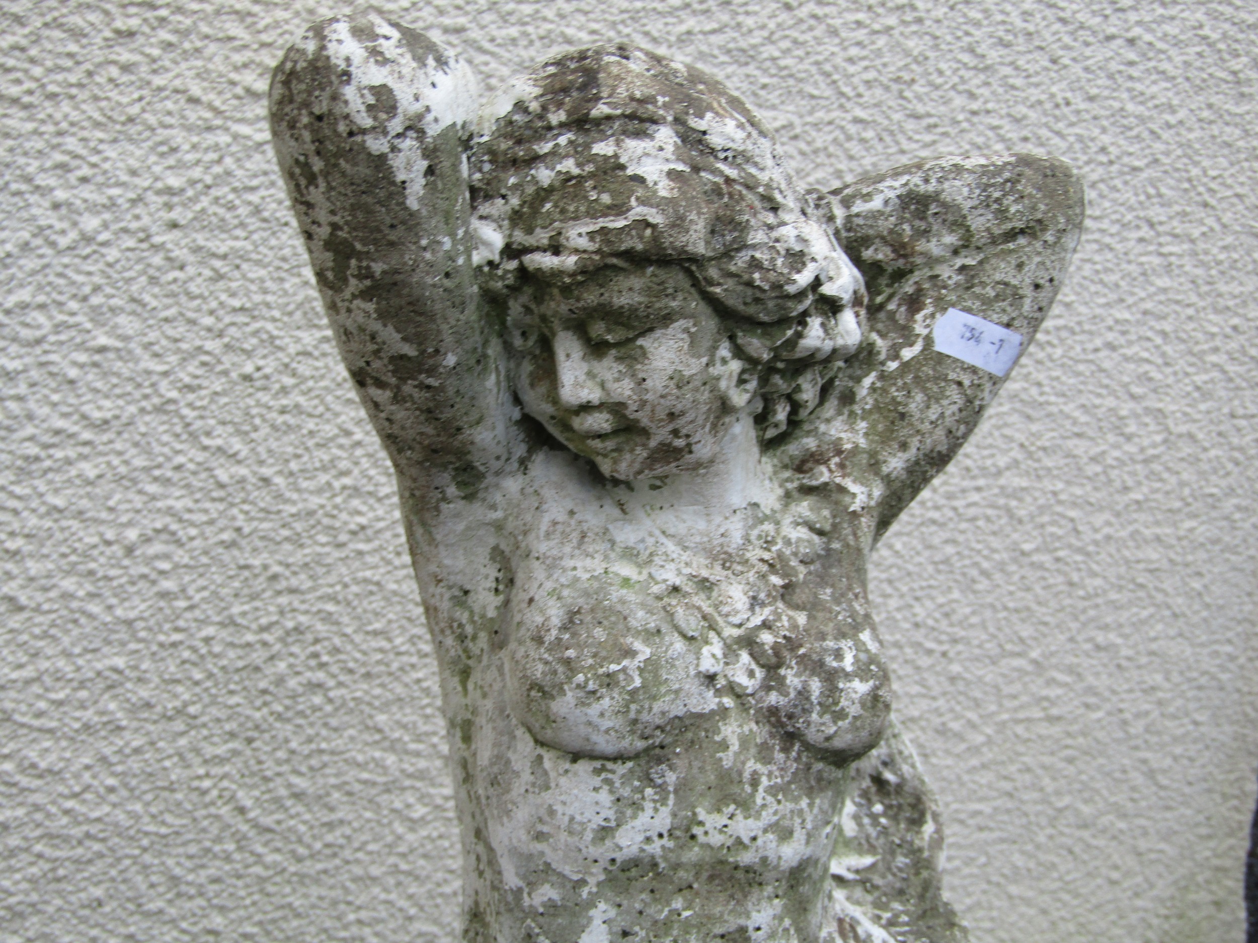 A painted and weathered cast composition stone garden statue in the form of a maiden with long - Image 3 of 4