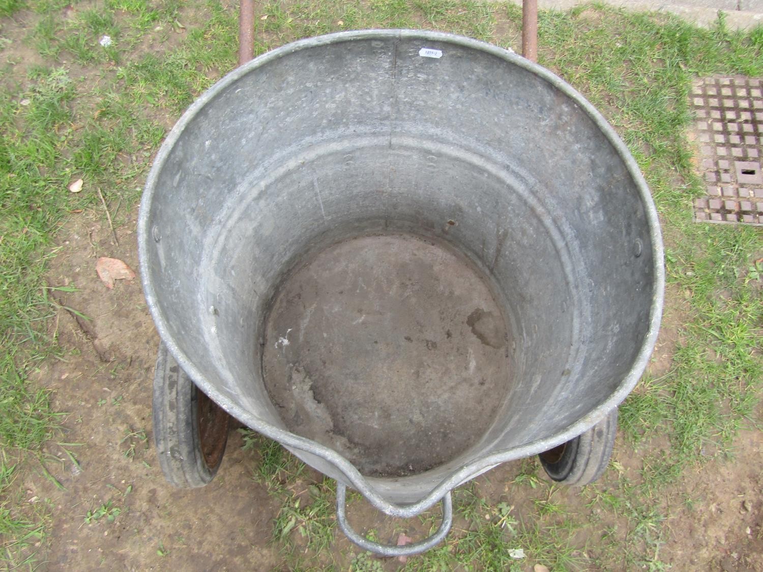 A vintage two wheeled water barrow, the iron frame supporting a cylindrical galvanised vessel - Image 4 of 5