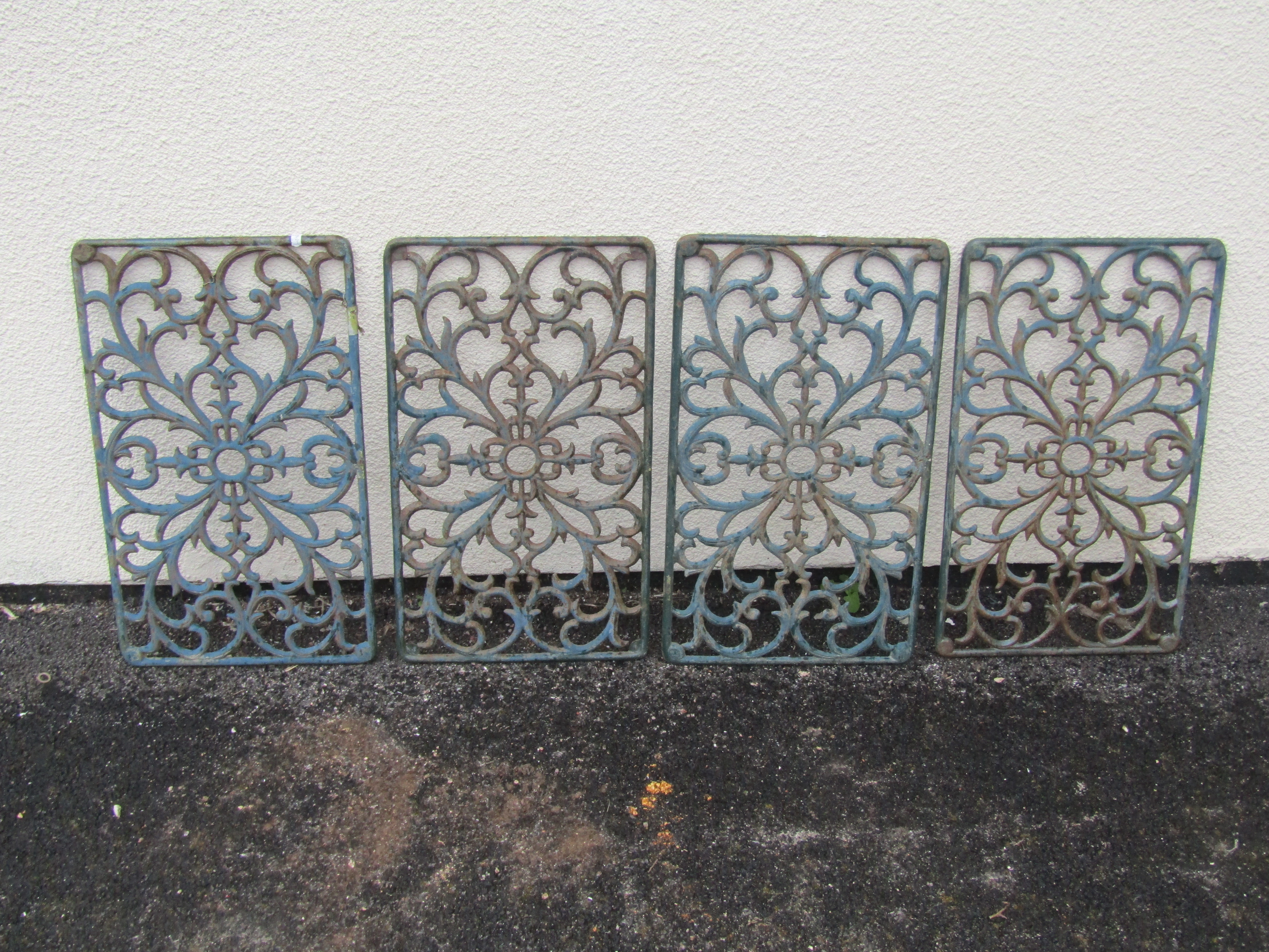 Four rectangular cast iron panels with pierced scrolling foliate detail, 59cm x 35cm - Image 2 of 3