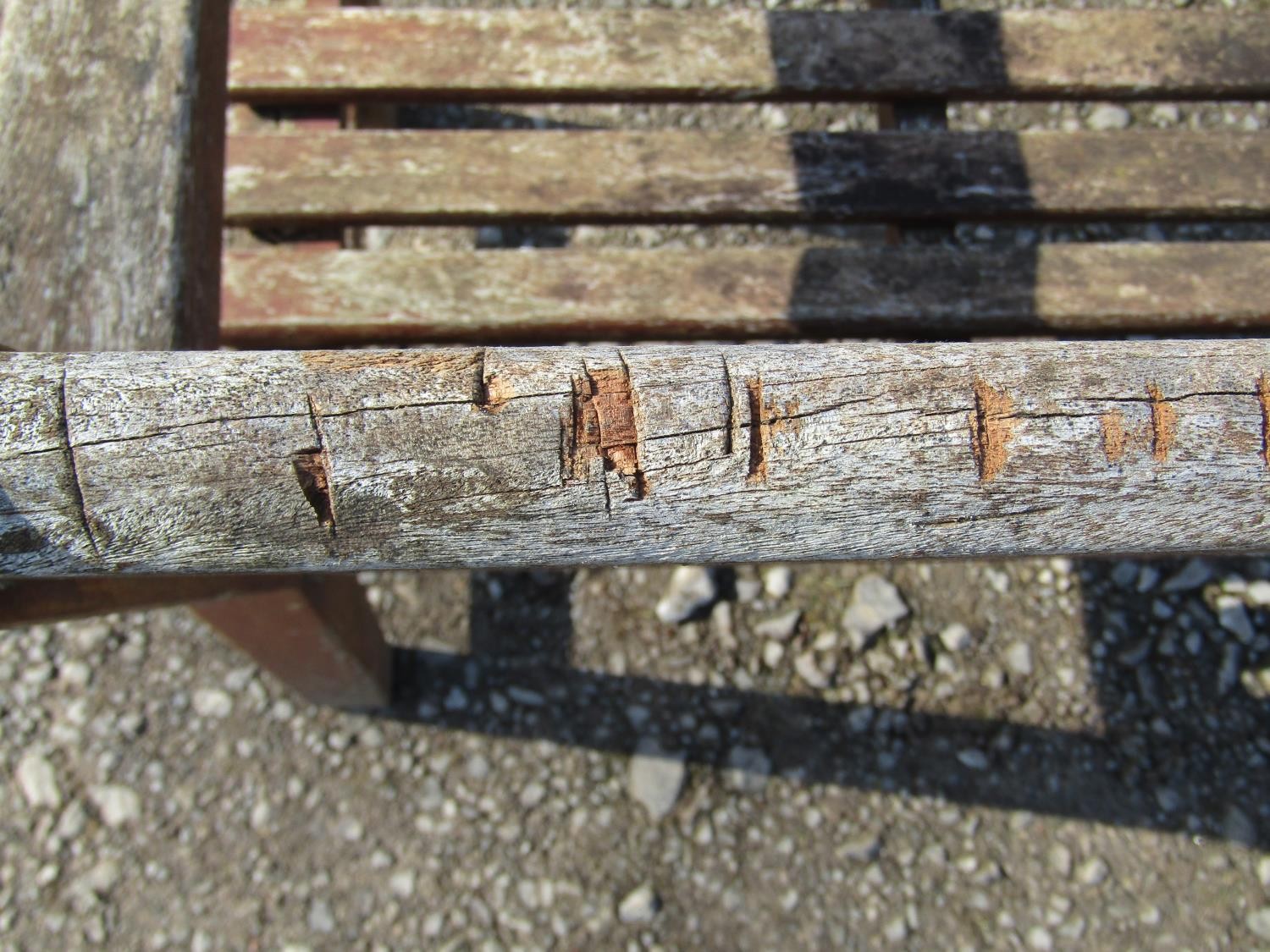 A pair of good quality heavy gauge weathered teak three seat garden benches with slatted seats and - Image 6 of 7