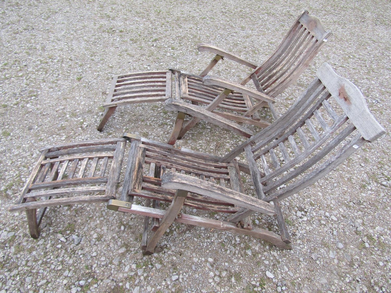 Two weathered teak folding steamer type chairs with slatted seats, backs and foot rests, with - Image 2 of 6