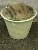 A matt glazed earthenware dairy pan/crock of circular tapered form with wooden cover, 32 cm high x