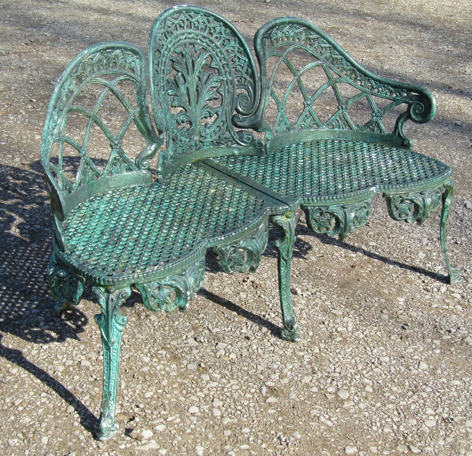 A weathered green painted cast alloy garden bench with shaped outline and decorative pierced - Image 5 of 10