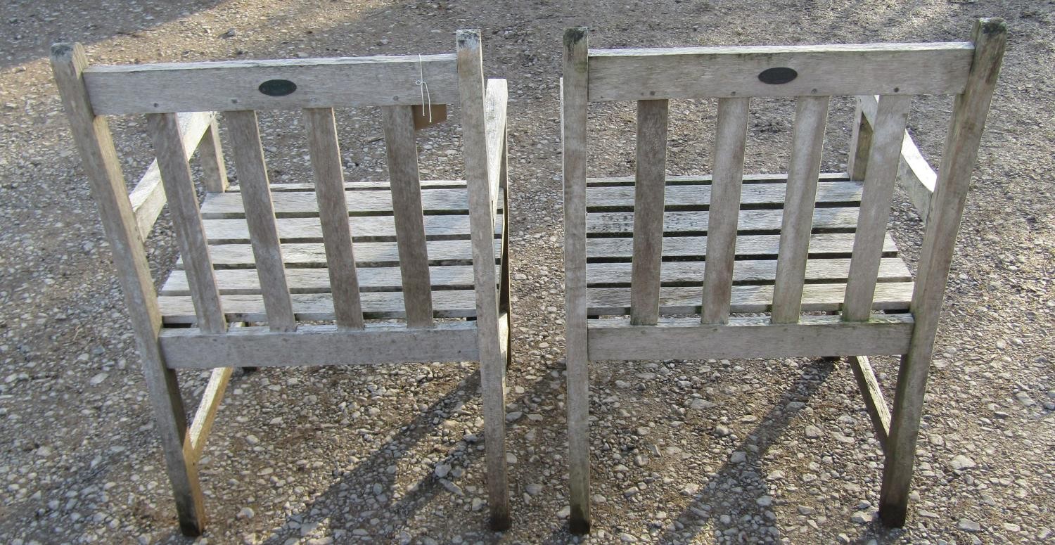 A pair of Firman weathered (silvered) teak garden open armchairs with slatted seats and backs ( - Image 4 of 5