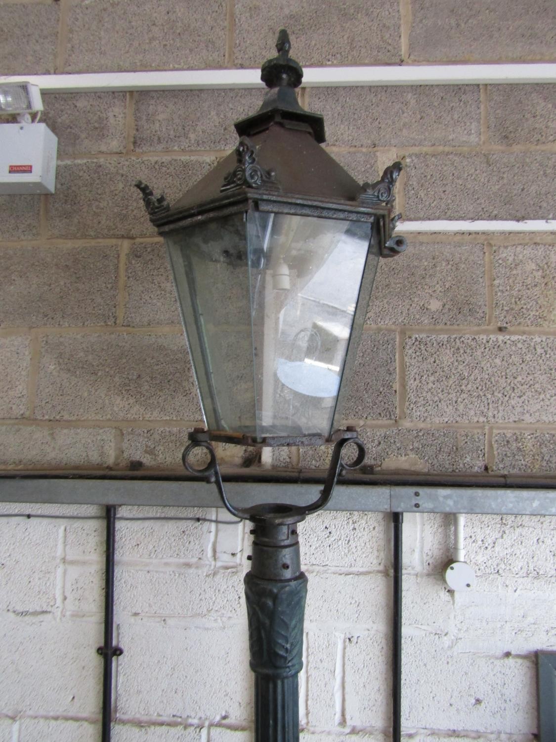 A Victorian style cast iron lamp post with hexagonal tapered hood raised on a partially fluted - Image 3 of 5