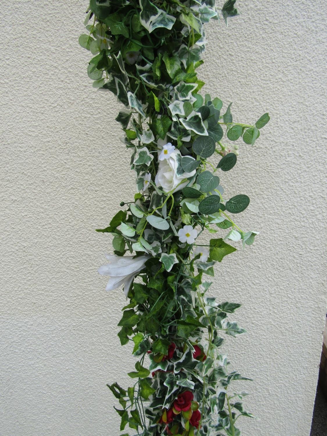 A painted square tubular steel framed wedding arch with trailing artificial ivy and floral detail, - Image 2 of 3