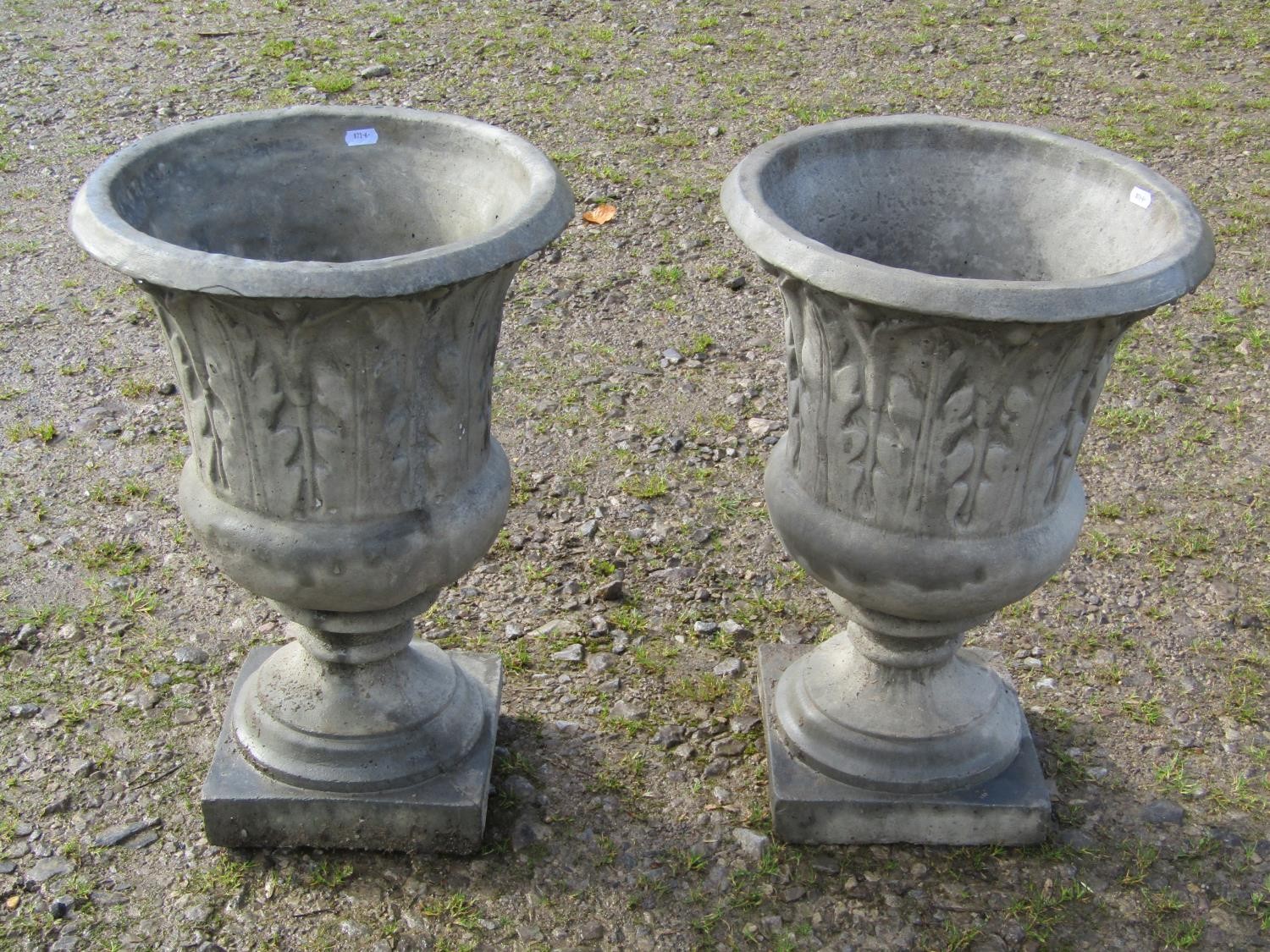 A pair of composition stone trumpet shaped garden urns, with moulded acanthus detail, raised on - Image 3 of 5