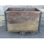 A vintage Slingsby wooden rectangular industrial cart with cast iron wheels, 76 cm high x 96 cm wide