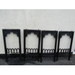 A matched set of four gothic 19th century cast iron fire place surrounds, each measuring 84 x 39