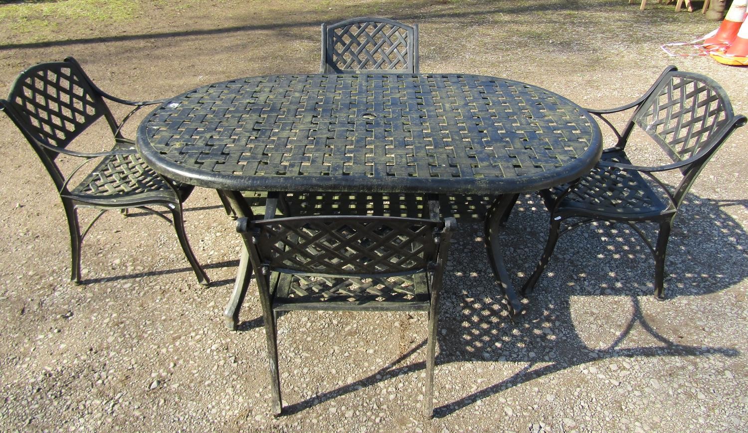 A good quality contemporary heavy gauge cast alloy five piece garden terrace set comprising oval two - Image 2 of 6