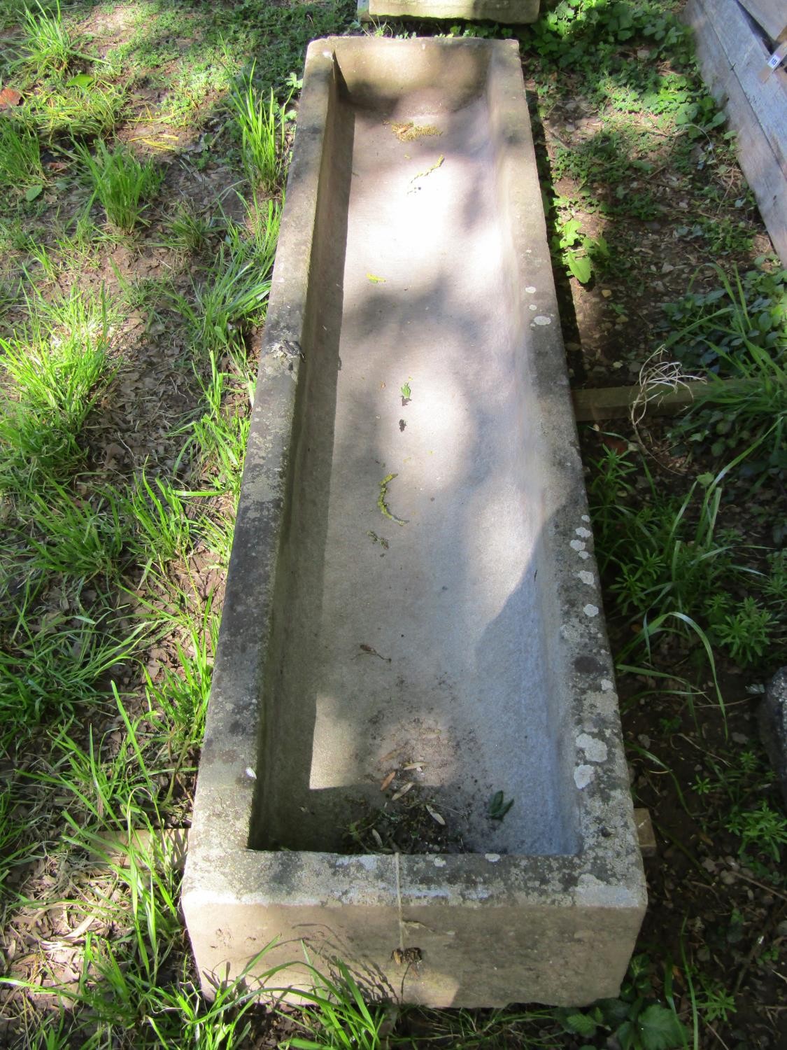 A weathered carved natural stone trough of rectangular form with slightly dished interior and - Image 3 of 3