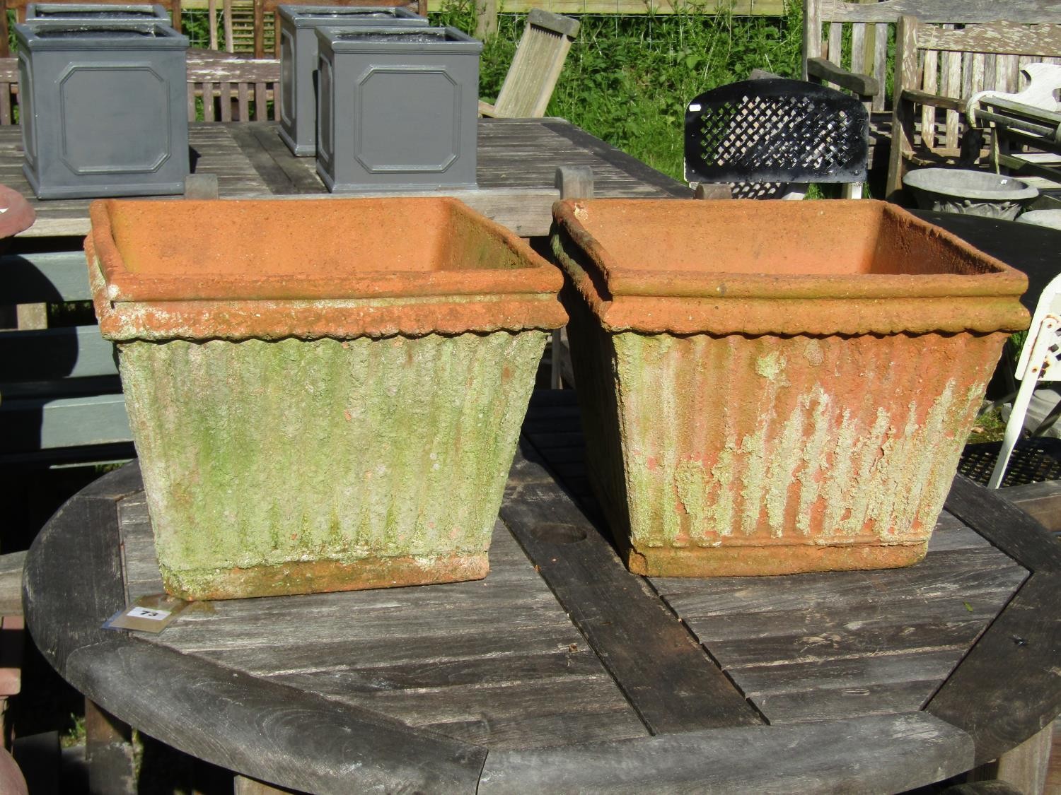 A pair of weathered terracotta square tapered and reeded planters, 30 cm high x 38 cm square - Image 2 of 6