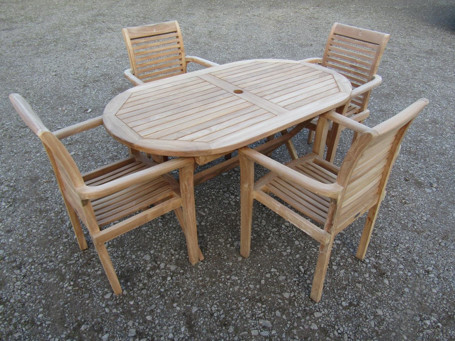 A contemporary weathered Cotswold collection garden table with oval slatted top raised on x framed - Image 2 of 9