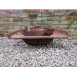 An antique cast iron wall mounted corner stable trough, 35 cm (full height) x 95 cm wide x 50 cm