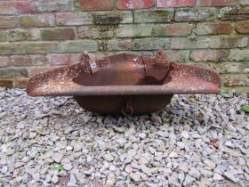 An antique cast iron wall mounted corner stable trough, 35 cm (full height) x 95 cm wide x 50 cm