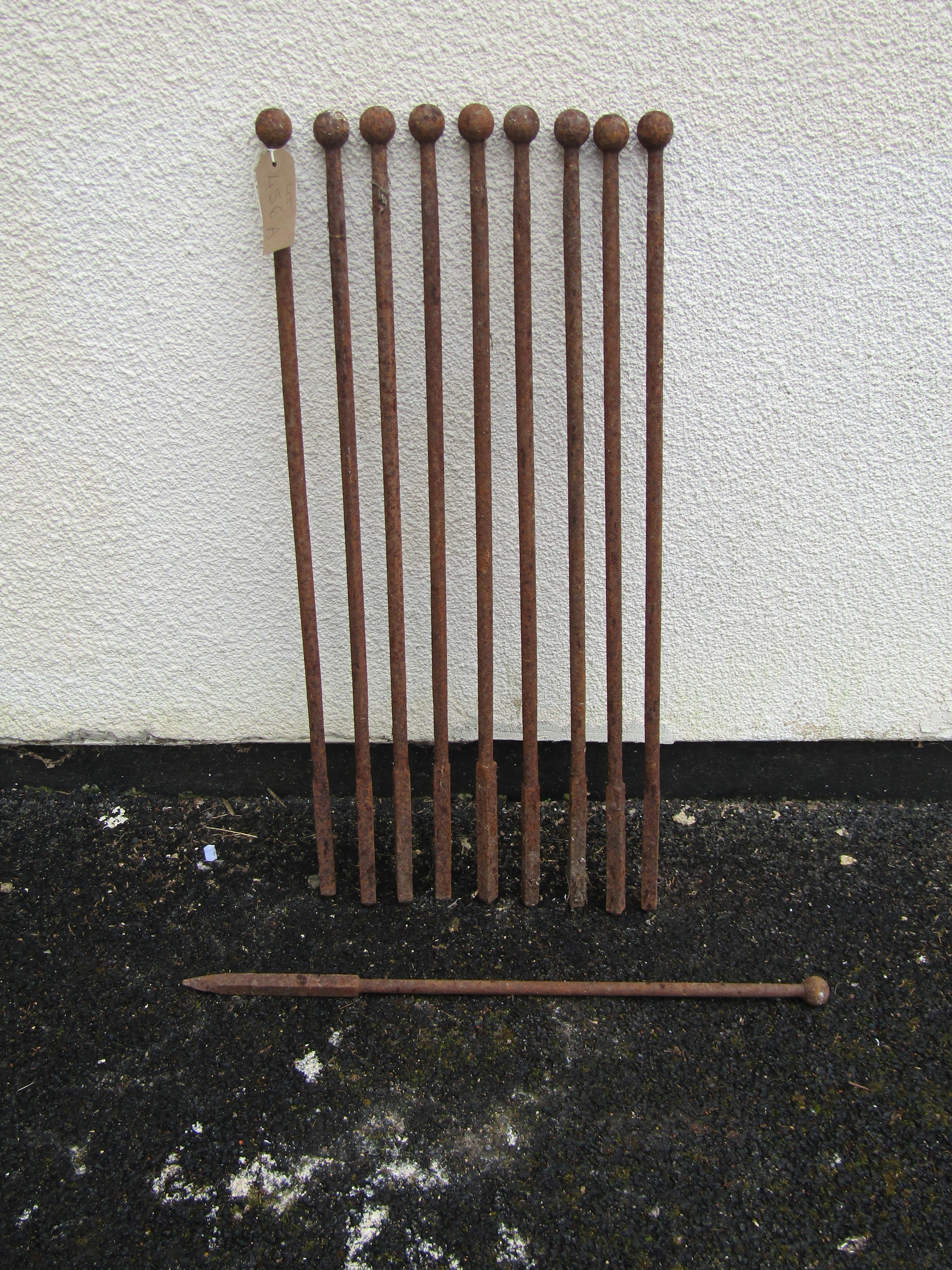 A run of nine antique iron rails/line stakes with ball finials, 77 cm high together with a matching - Image 3 of 3