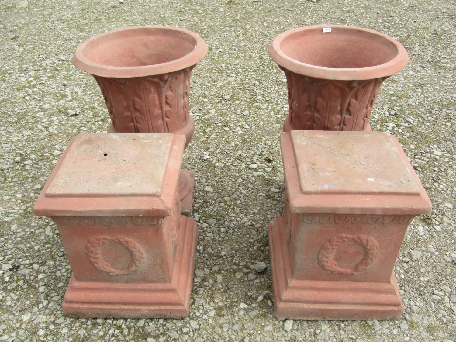 A pair of faux terracotta cast composition stone trumpet shaped garden urns with repeating leaf - Image 6 of 6