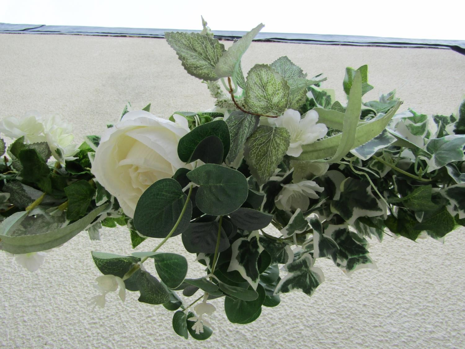 A painted square tubular steel framed wedding arch with trailing artificial ivy and floral detail, - Image 3 of 3