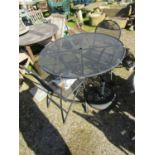 A contemporary Kettler coated light steel circular garden terrace table raised on swept supports,
